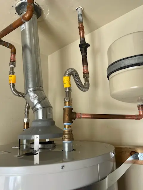 Water heater installation and plumbing repair in Woodward
